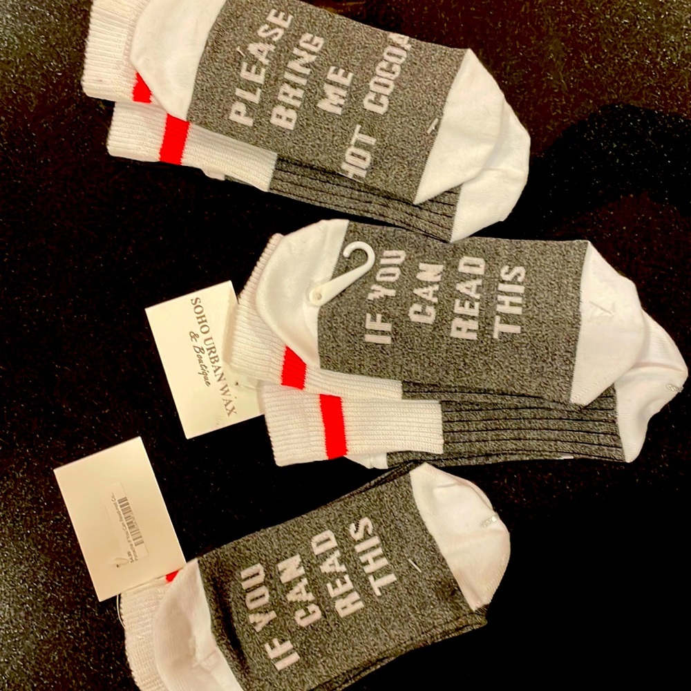 3 mid calf socks; color; white/ gray / red stripe.